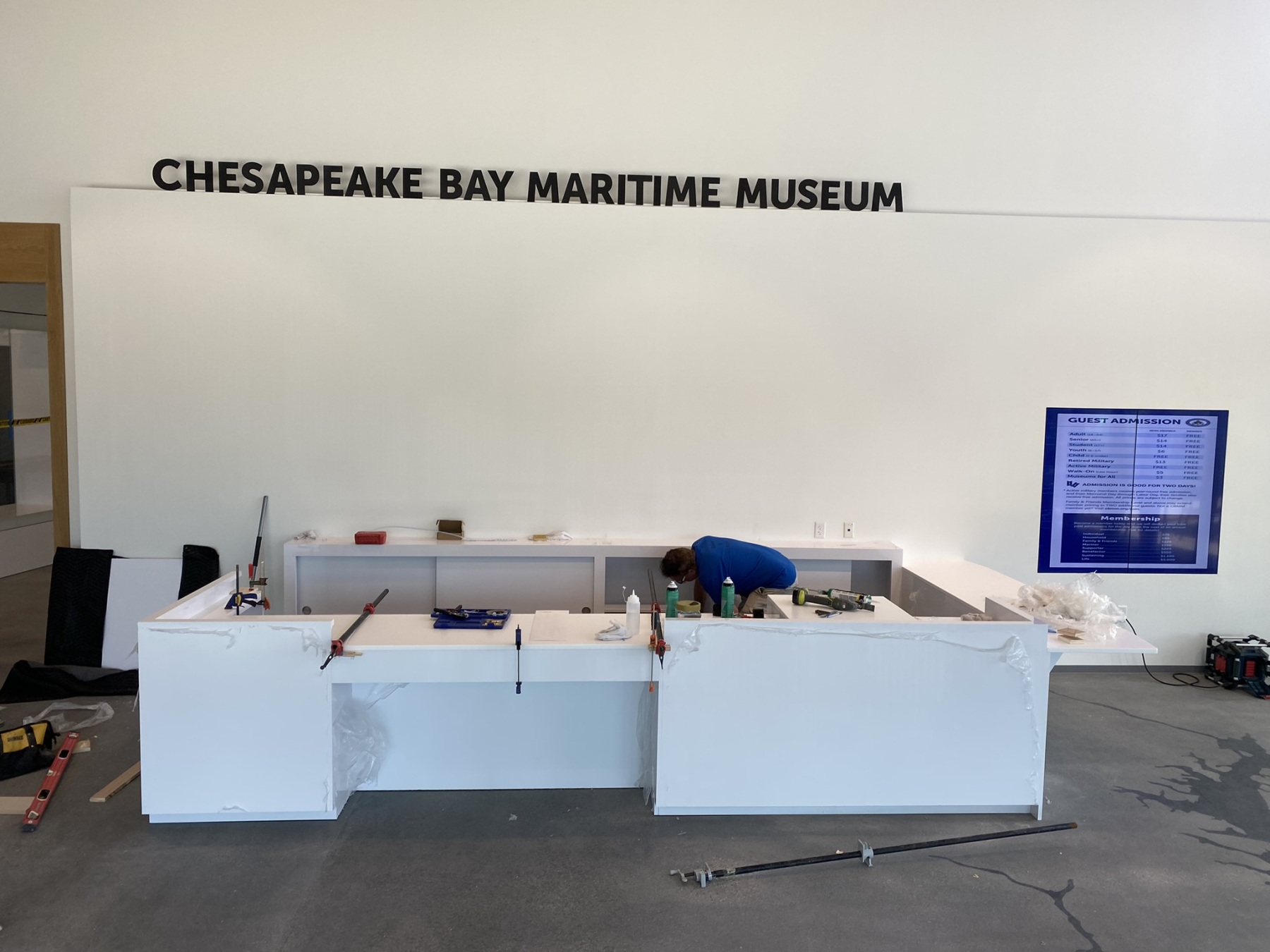 SMFW crew installing the main reception desk at the Chesapeake Bay Maritime Museum Welcome Center