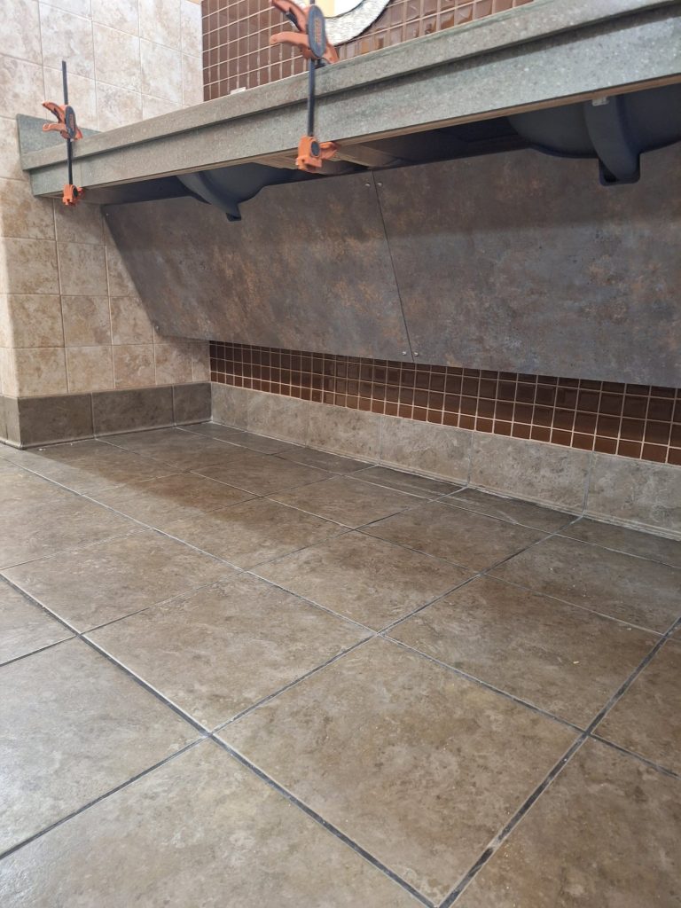 Under-sink laminate access panels during ADA vanity installation