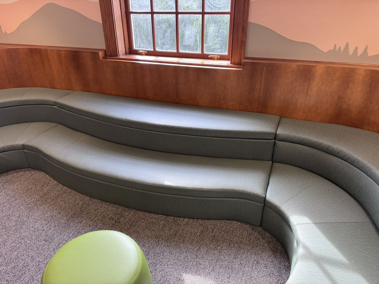 Detail of two-level curved bench cushions in Mayer Fabrics Algae Midway at Petworth Neighborhood Library