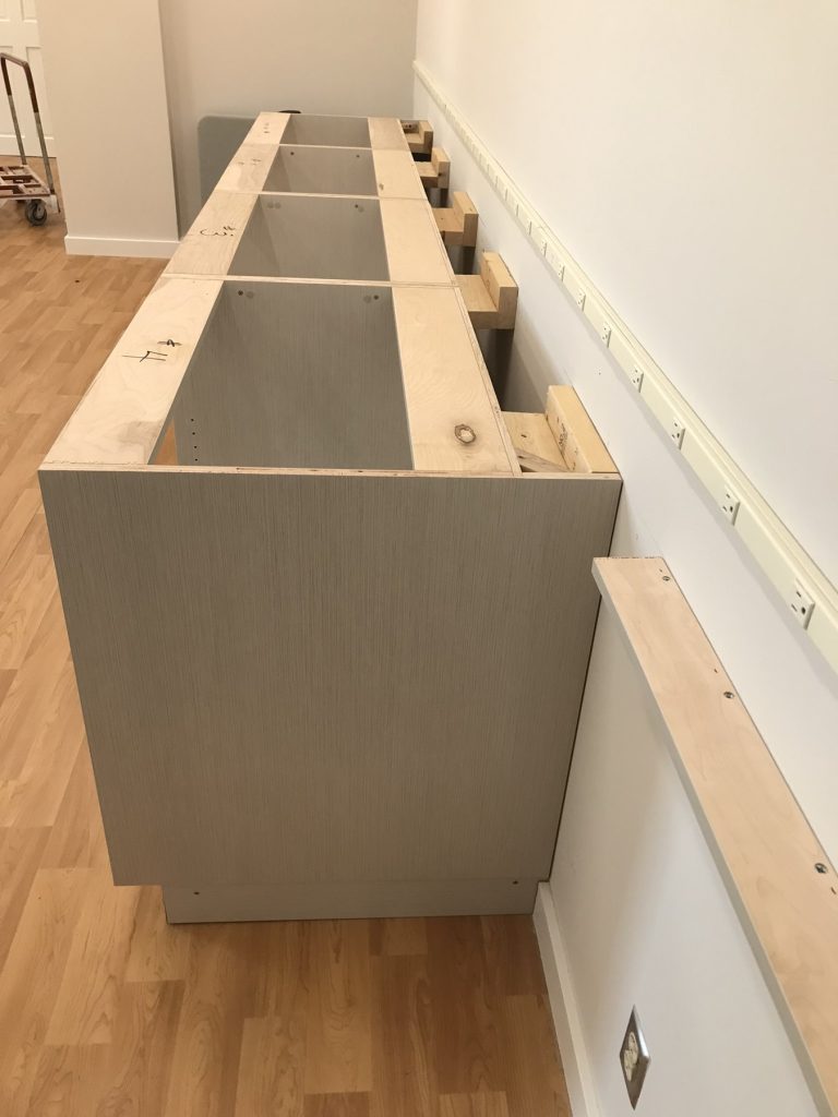 SMFW casework installation in progress at the Washington College Central Services mail room